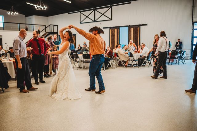 Mara wedding photo dancing with Sam