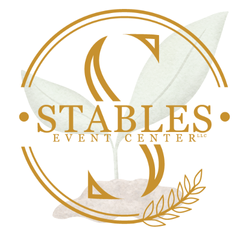 Logo of Stables Event Center LLC Homestead Seed Summit event featuring a stylized letter "S" surrounded by a circular, gold emblem with leaves and a small sprout design in the background.